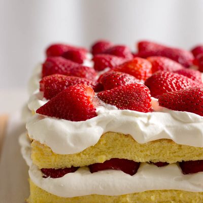Strawberry Sponge Cake / JillHough.com Sweet and creamy, soft and pillowy, fruity and bright—this cake is one of my favorite foods that my grandmother used to make. #strawberry #cake #whippedcream #spongecake