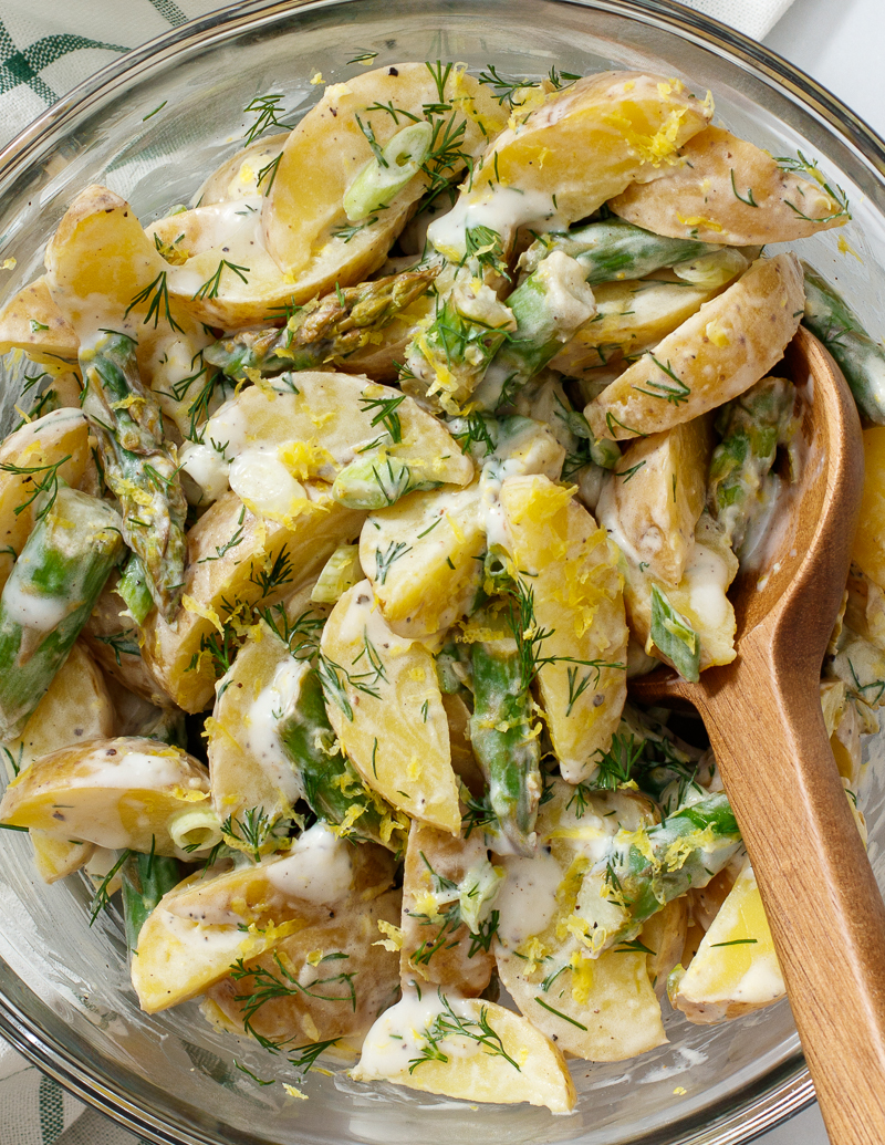Spring Potato Salad with Asparagus and Lemon / JillHough.com Tangy with lemon, creamy with yogurt (perfect for mayo haters), and showered with fresh dill. #potatosalad #potatoes #asparagus #lemon #dill