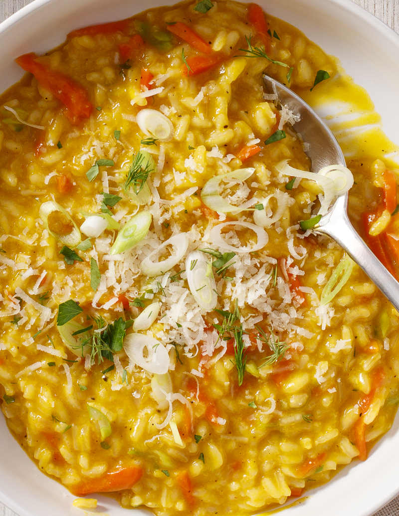 Carrot Risotto with Scallions / JillHough.com With a boost of flavor from carrot juice, its sweetness nicely balanced by savory Parmesan, and an amazing marigold color. #risotto #carrotrisotto #carrots #scallions #parmesan