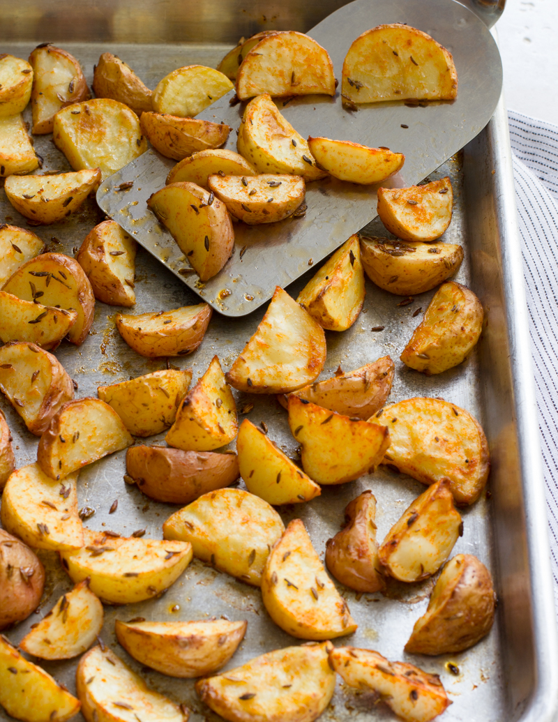Cumin-Roasted Potatoes / JillHough.com Tender, sweet baby or creamer potatoes get tossed with whole cumin seeds, and paprika, plus plenty of salt and olive oil.