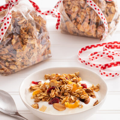 Holiday Cranberry Orange Granola / JillHough.com Laced with cranberries, oranges, and holiday spices, this yummy granola will put you in a festive mood. Enjoy it yourself or for gift-giving.