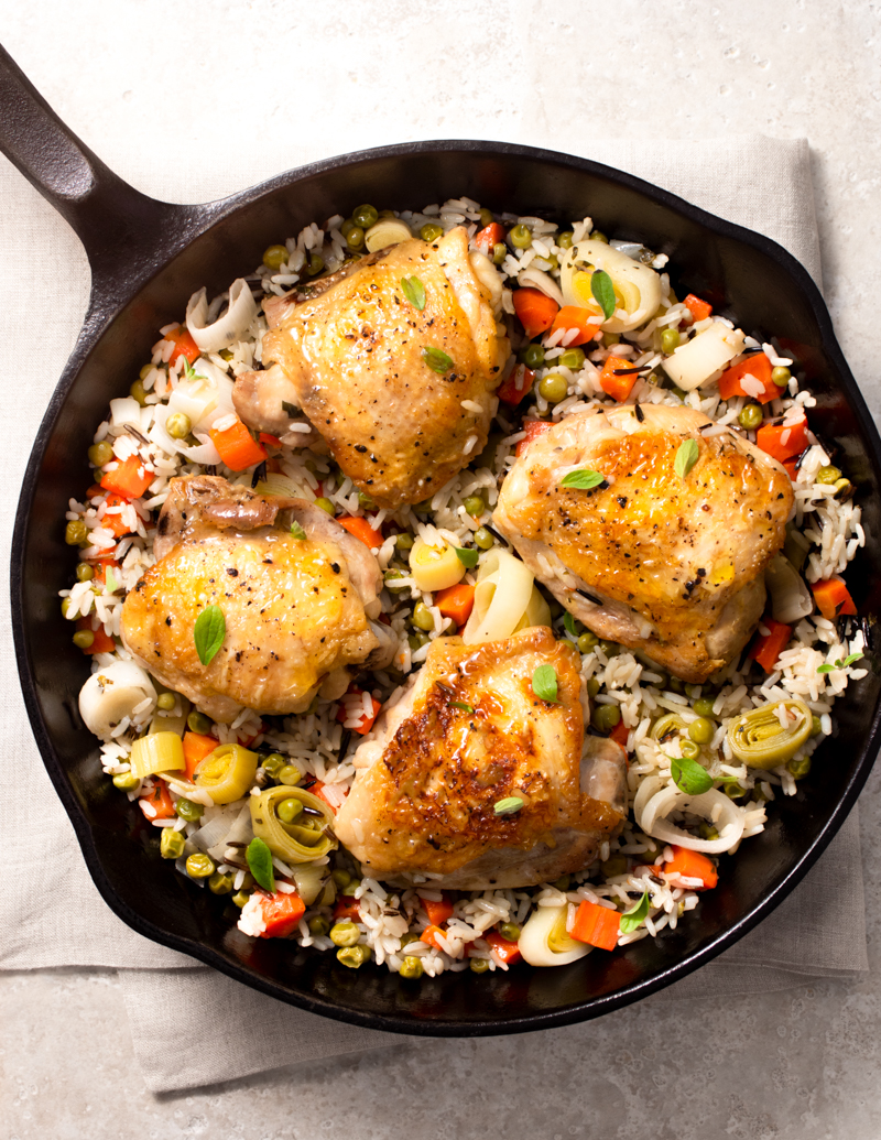 Spring Chicken and Rice Stovetop Casserole / JillHough.com This one-skillet dinner features one of the all-time great combinations—chicken, rice, and seasonal vegetables.