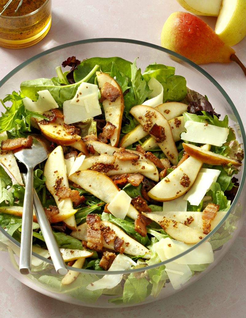 Mixed Greens with Pears, Bacon, Gruyere, and Warm Mustard Vinaigrette / JillHough.com Spicy and sweet, this salad would nicely complement lamb chops, pork chops, steak, or a hearty soup or stew. #pears #bacon #pearsalad #fallsalad #gruyere #mustard #vinaigrette