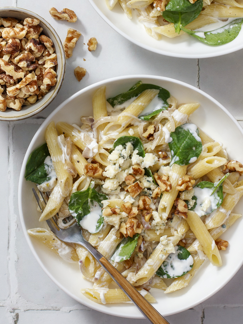 Pasta with Blue Cheese, Spinach, and Walnuts / JillHough.com A simple-yet-special pasta dish with a creamy sauce that’s indulgent-but-not-too. It’s also pretty malleable. If you don’t like blue cheese, substitute goat cheese. Or make it with arugula or baby kale instead of spinach, or pine nuts instead of walnuts (but start with fewer and see what you like). And if you have a little sliced chicken or some shrimp, that’s good in there too. #pasta #bluecheese #spinach #walnuts #creamypasta #easypasta