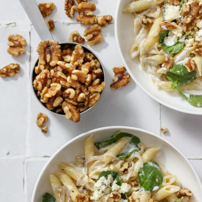 Pasta with Blue Cheese, Spinach, and Walnuts / JillHough.com A simple-yet-special pasta dish with a creamy sauce that’s indulgent-but-not-too. It’s also pretty malleable. If you don’t like blue cheese, substitute goat cheese. Or make it with arugula or baby kale instead of spinach, or pine nuts instead of walnuts. And if you have a little sliced chicken or some shrimp, that’s good in there too. #pasta #bluecheese #spinach #walnuts #creamypasta #easypasta