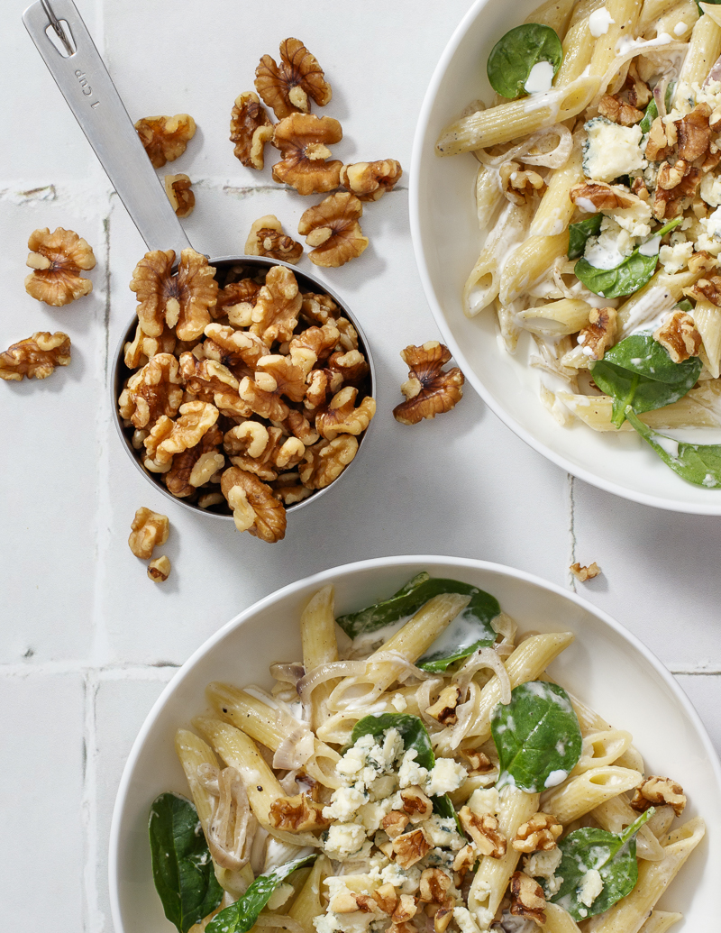Pasta with Blue Cheese, Spinach, and Walnuts / JillHough.com A simple-yet-special pasta dish with a creamy sauce that’s indulgent-but-not-too. It’s also pretty malleable. If you don’t like blue cheese, substitute goat cheese. Or make it with arugula or baby kale instead of spinach, or pine nuts instead of walnuts. And if you have a little sliced chicken or some shrimp, that’s good in there too. #pasta #bluecheese #spinach #walnuts #creamypasta #easypasta