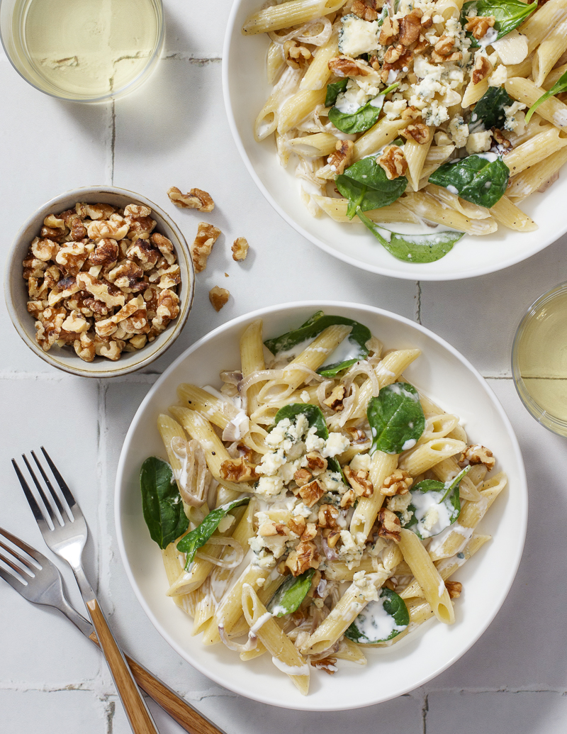 Pasta with Blue Cheese, Spinach, and Walnuts / JillHough.com A simple-yet-special pasta dish with a creamy sauce that’s indulgent-but-not-too. It’s also pretty malleable. If you don’t like blue cheese, substitute goat cheese. Or make it with arugula or baby kale instead of spinach, or pine nuts instead of walnuts (but start with fewer and see what you like). And if you have a little sliced chicken or some shrimp, that’s good in there too. #pasta #bluecheese #spinach #walnuts #creamypasta #easypasta