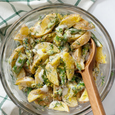 Spring Potato Salad with Asparagus and Lemon / JillHough.com Tangy with lemon, creamy with yogurt (perfect for mayo haters), and showered with fresh dill. #potatosalad #potatoes #asparagus #lemon #dill