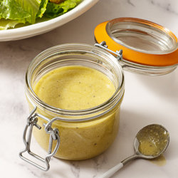 A deliciously satisfying and umami-packed Caesar dressing that you can make with the push of a button on your blender or food processor. It’s also conveniently raw egg yolk-free. #caesar #caesarsalad #caesarsaladdressing #ceasarsalad #ceasarsaladdressing #dressing #saladdressing