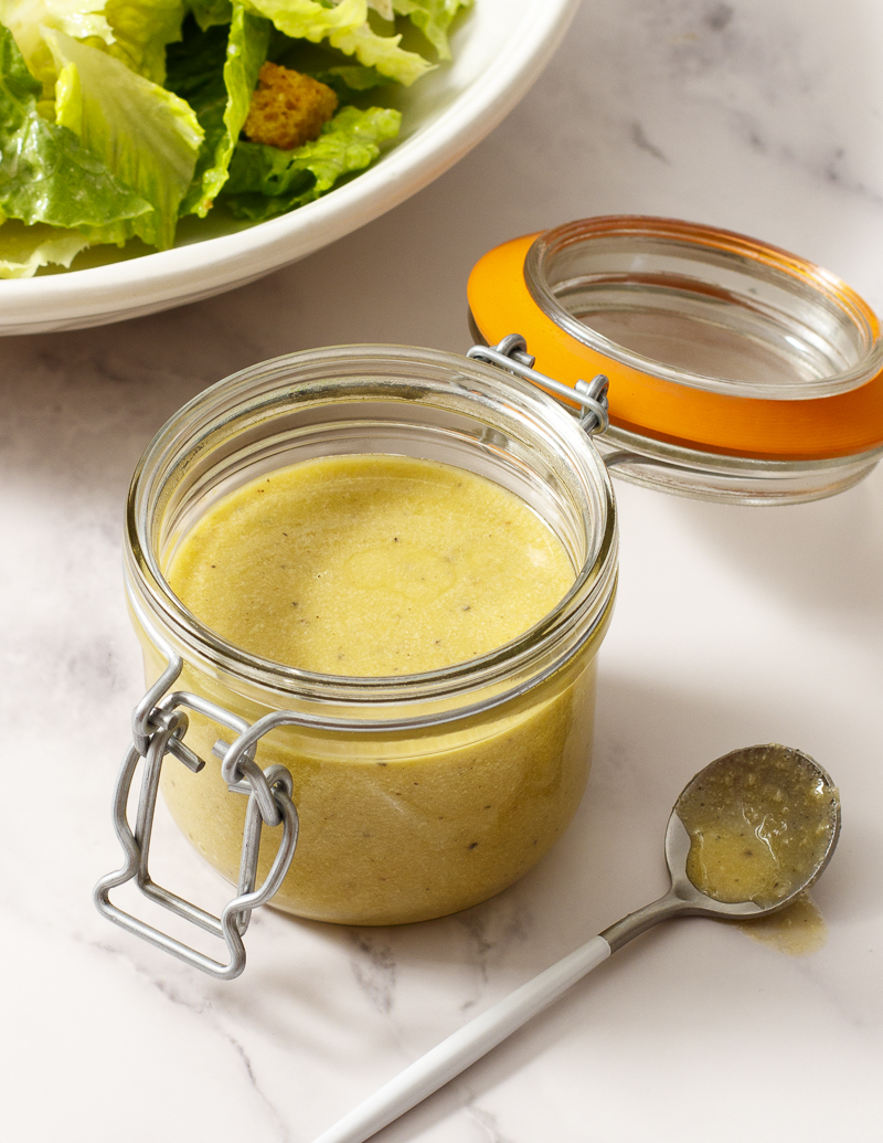 Caesar Salad Dressing / JillHough.com A deliciously satisfying and umami-packed Caesar dressing that you can make with the push of a button on your blender or food processor. It’s also conveniently raw egg yolk-free. #caesar #caesarsalad #caesarsaladdressing #ceasarsalad #ceasarsaladdressing #dressing #saladdressing