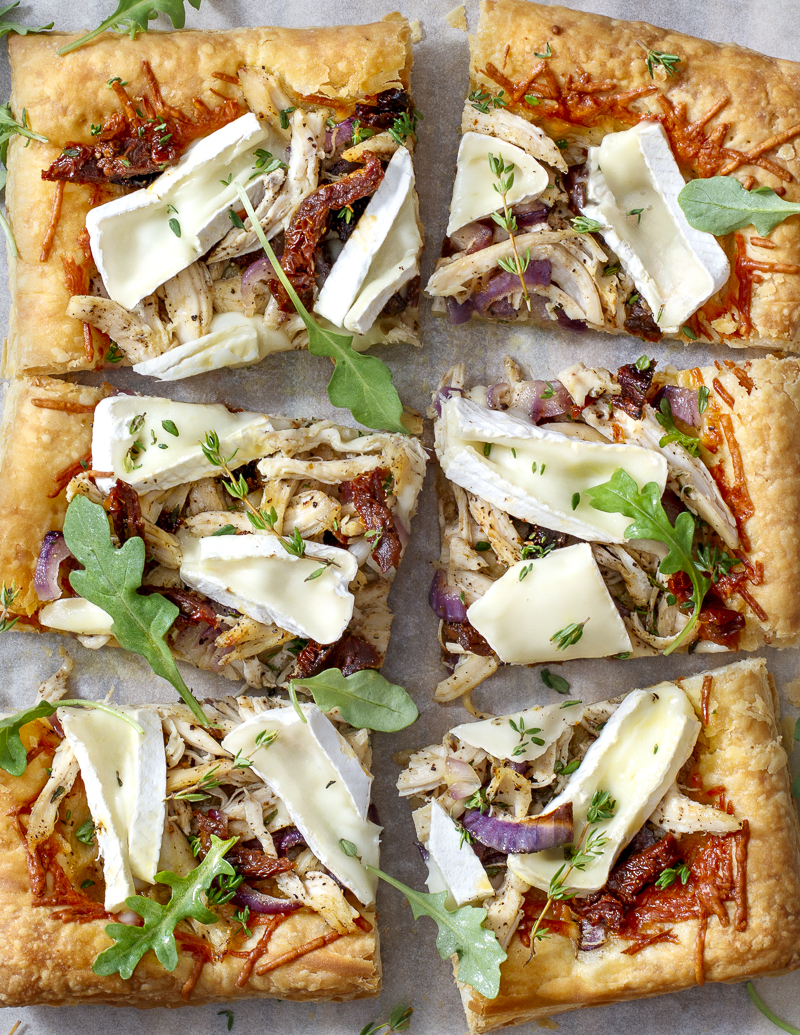 Chicken, Sundried Tomato, and Brie Puff Pastry Tart / JillHough.com Chicken, sundried tomatoes, brie, and always-elegant puff pastry make a meal that's deliciously simple and, yes, a little snazzy. #chicken #chickentart #puffpastry #sundriedtomatoes #brie #puffpastrytart